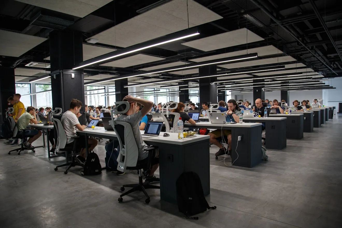Staffing agency team working in an open-plan office